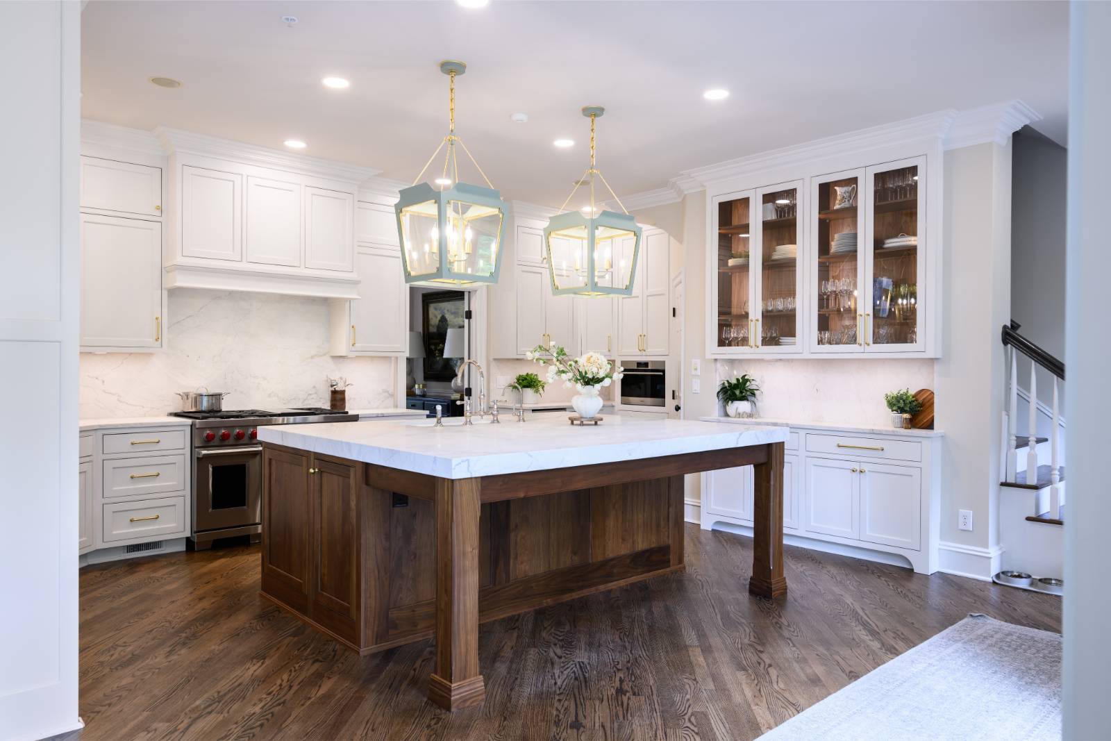 Two-tone kitchen with walnut island and white cabinetry in Cary, NC
