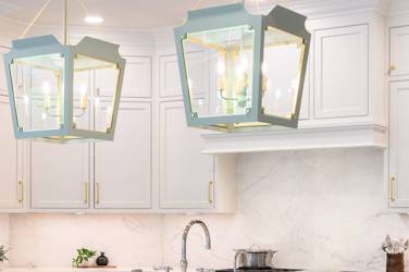 Two-tone kitchen with walnut island and white cabinetry in Cary, NC