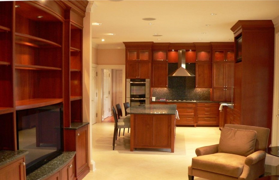 contemporary shaker style built-in bookcases, entertainment center, and kitchen cabinets by Carolina Cabinet Specialist