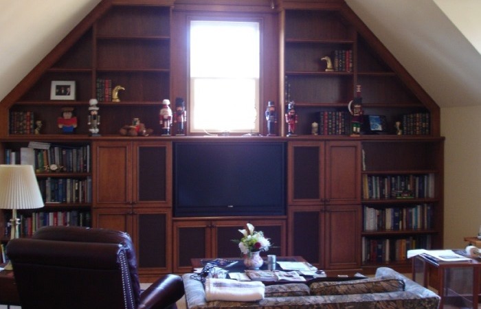 Remodel a Bonus Room to a built-in entertainment center with Book cases