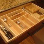 Carolina Cabinet Specialist can turn a boring kitchen drawer into a usable flatware drawer