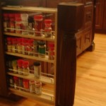Let Carolina Cabinet Specialist create a pull-out spice rack for those small spaces