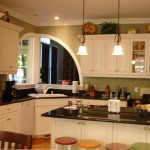 update the look of your kitchen by replacing your cabinets